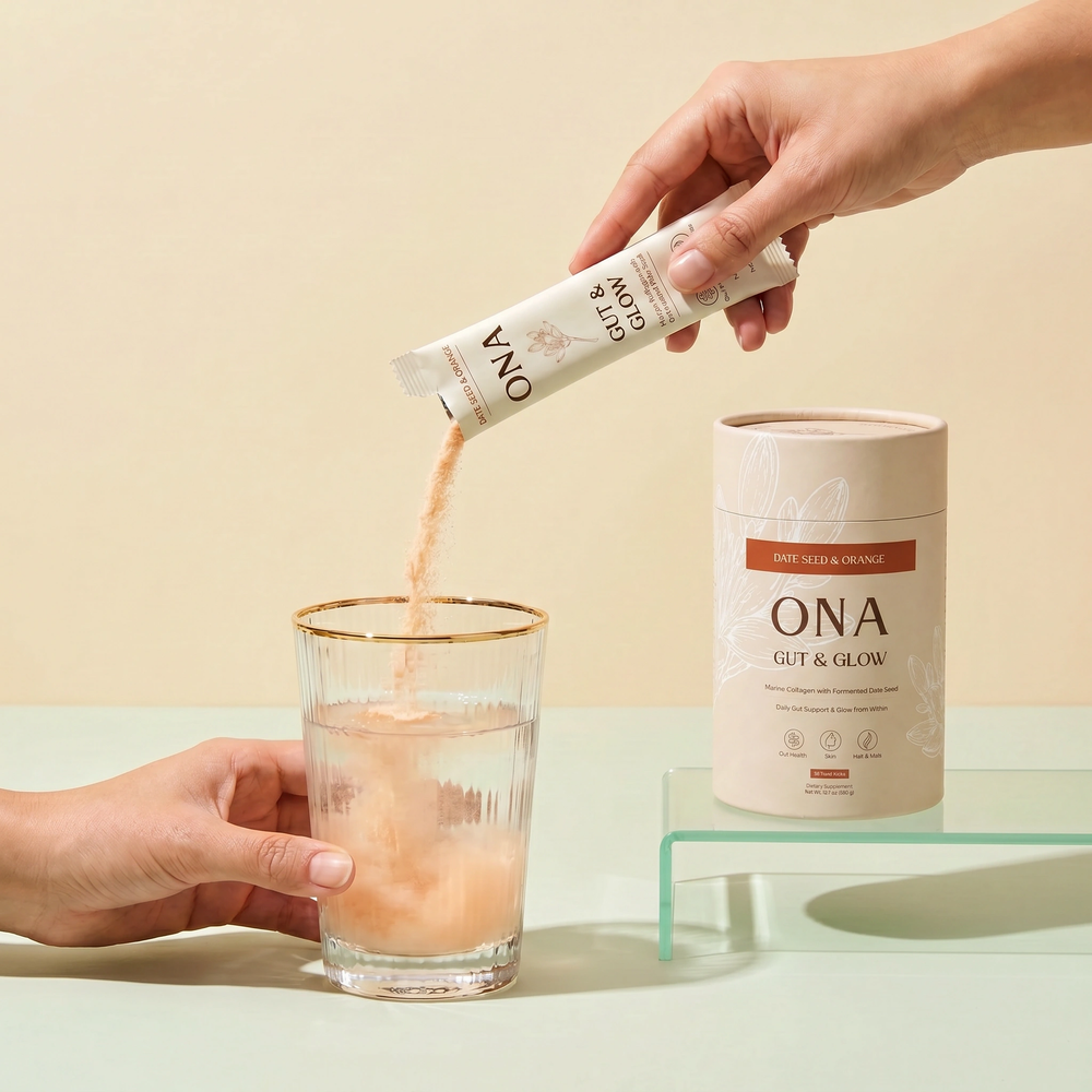 Pouring a stick of ONA Gut & Glow into a glass of water